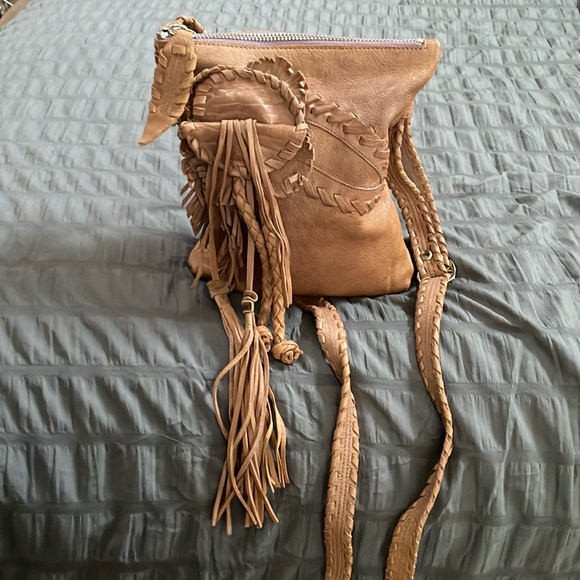 Nordstrom Handbags - NORDSTROM genuine leather crossbody purse with tassels.